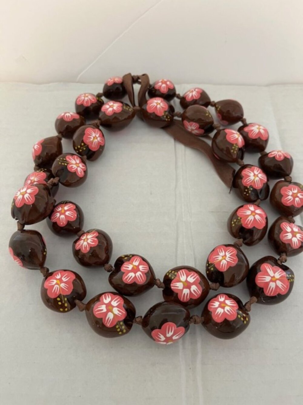 Hand painted wooden necklace.